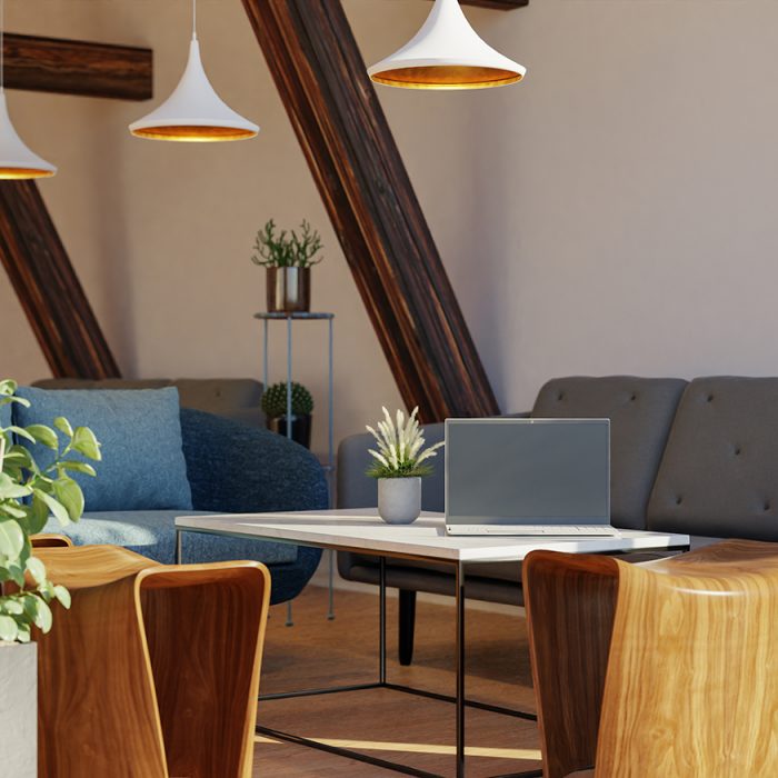 Office with furniture, work desk and laptop