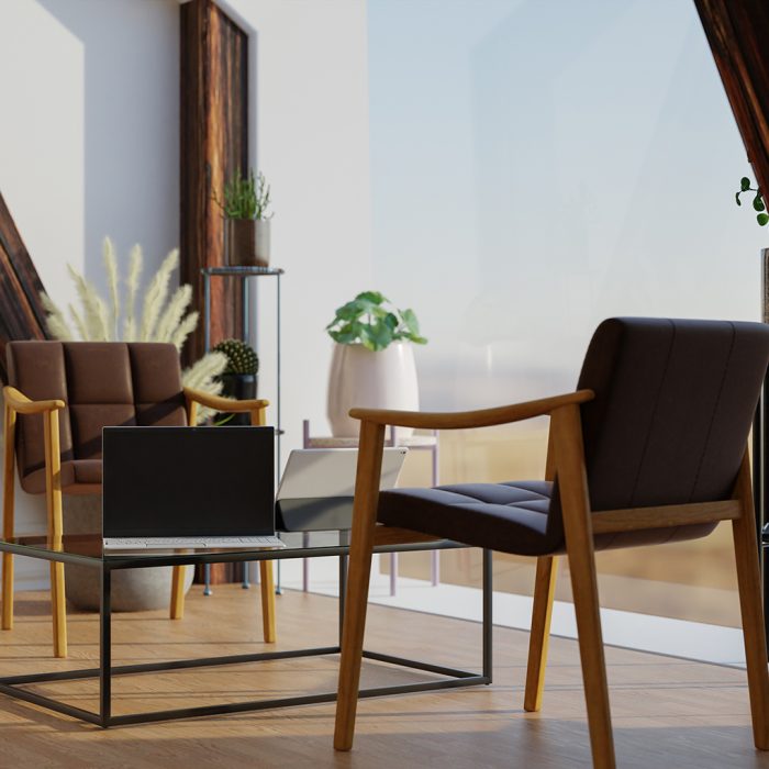 Office with furniture, work desk and laptop