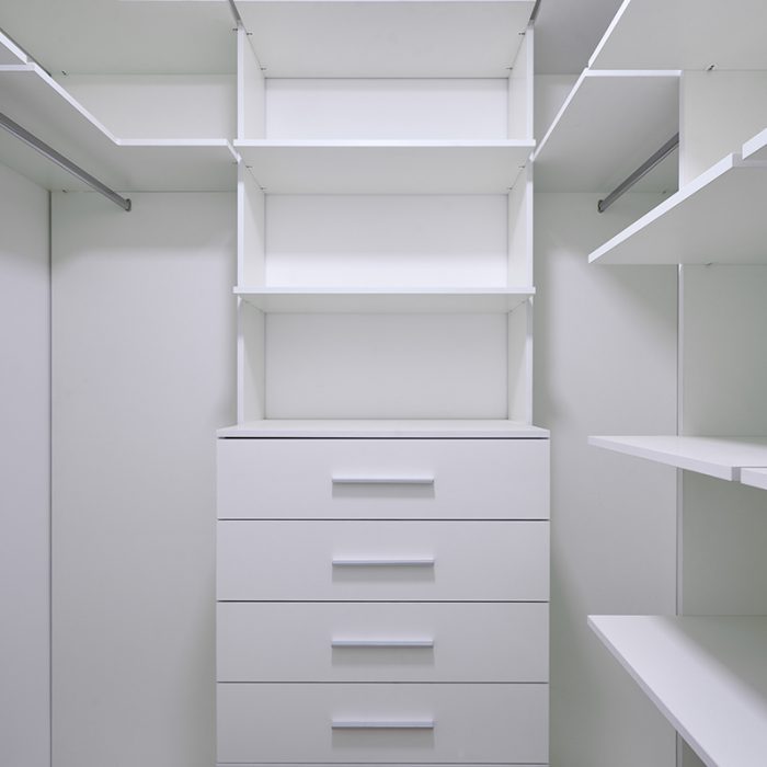 Modern empty closet in the hotel for different needs and clothes. nobody